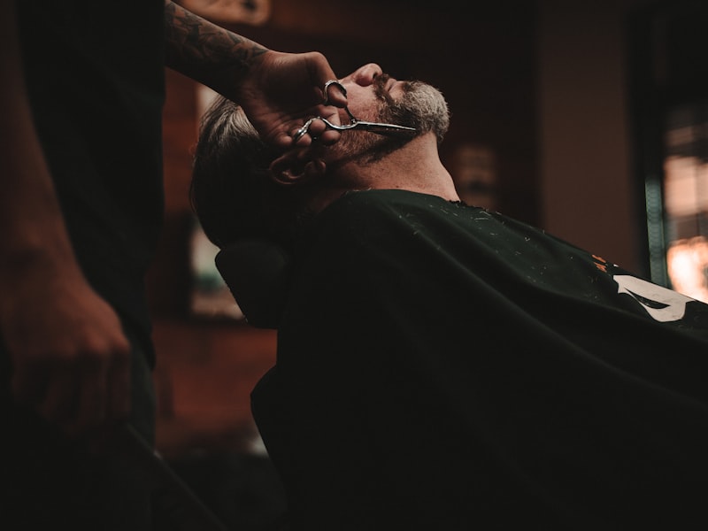 Taper fade with beard work at KLUTCH Barbershop Montreal